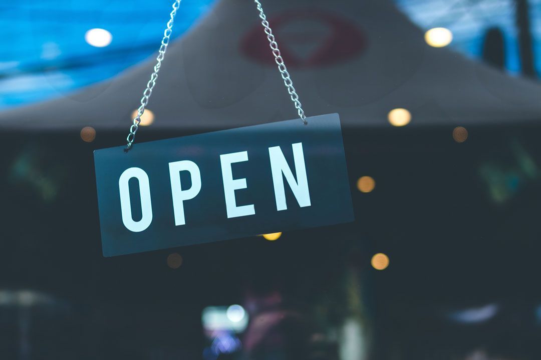 Selective focus photography of open signage